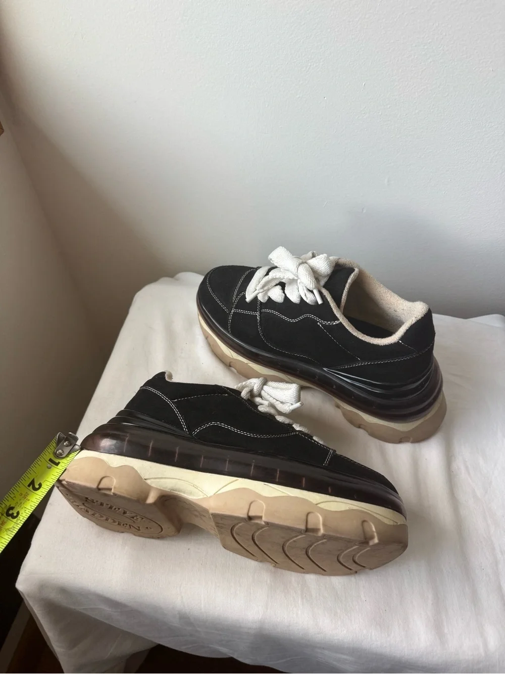 Steve Madden Evolved Sneaker in black with a chunky cream and tan platforms 9.5
